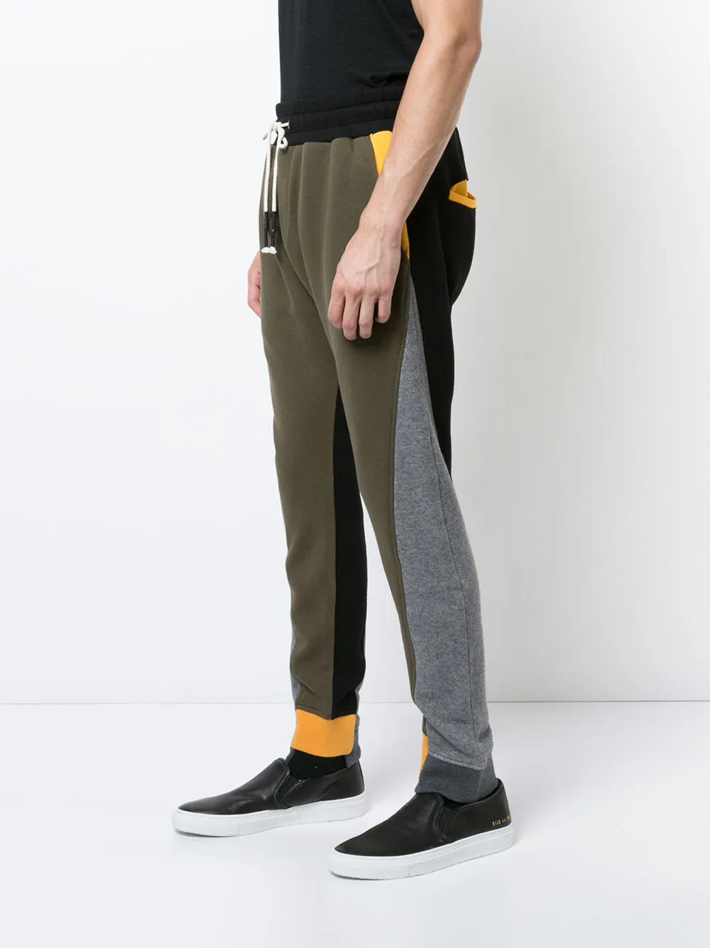COLOR BLOCKING OFF SET LEG JOGGER (GREEN/BLACK)